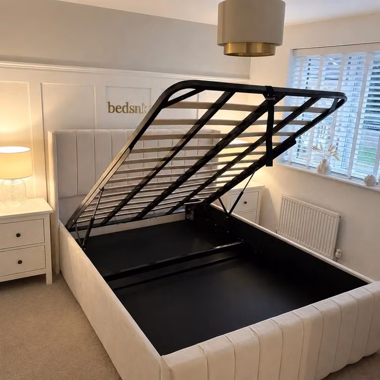 Parker Upholstered Bed Frame with Lift Up Base by Beds NK Ltd in Beige