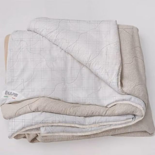 The White Stone Carbon Fiber Reversible Double-Sided Quilted Throw Blanket in Beige and White, W/D/H: 220 x 240 cm