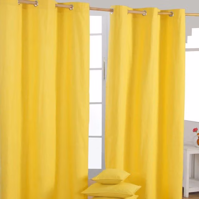 Homescapes Plain Yellow Cotton Eyelet Curtain Pair