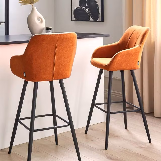 Wyld and Coco Signature Set of 2 Orange Quilted Fabric Bar Stools with Armrests and Powder Coated Metal Frame – 1