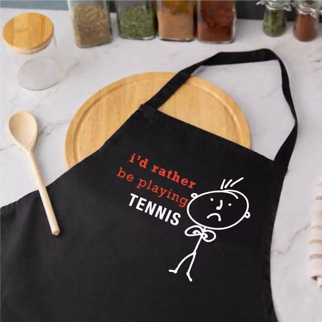 60 Second Makeover Men's I'd Rather Be Playing Tennis Apron in Black – 1