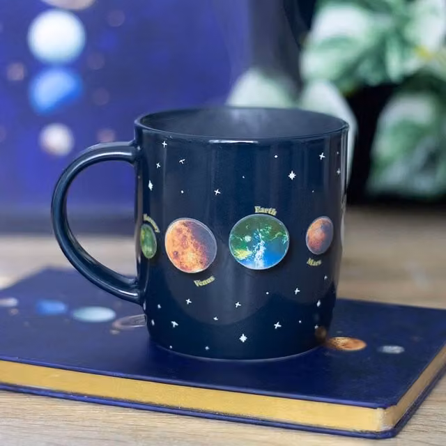 Uniqueful Solar System Heat Changing Ceramic Mug in Black, 500 ml