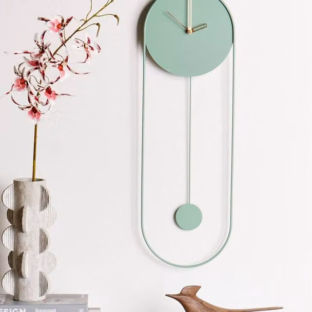 Wyld and Coco Modern Oval Pendulum Wall Clock in Green and Gold Metal, W/H: 20 x 62 cm