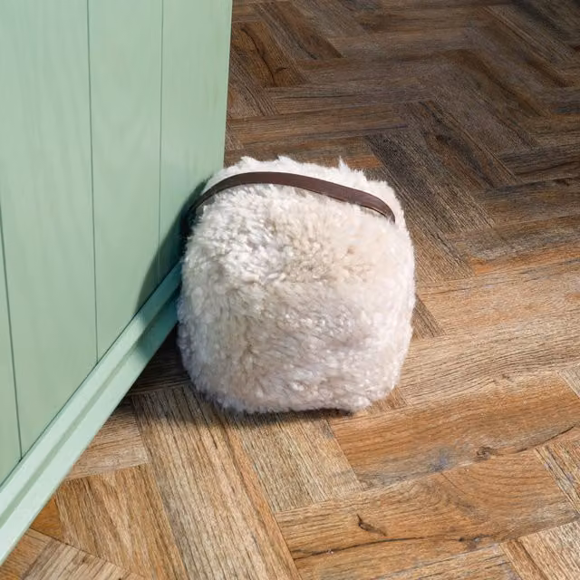Native Natural Round Sheepskin Doorstop in Beige and Brown
