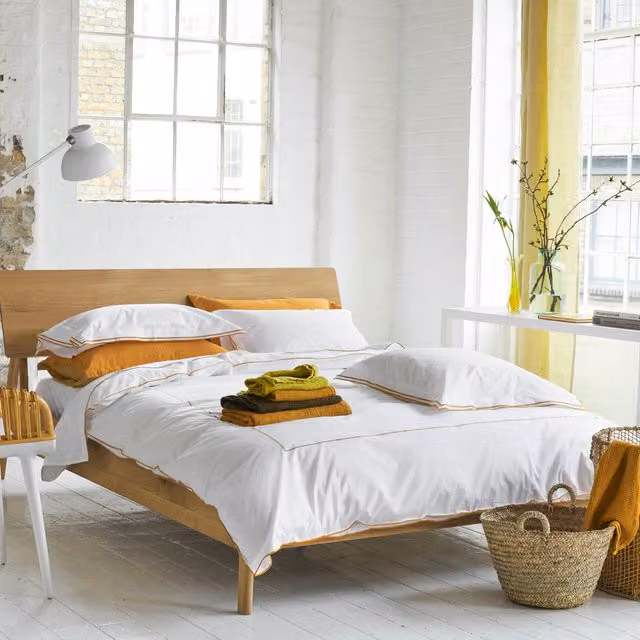 Designers Guild Astor Cotton Percale Duvet Cover and Pillowcase Set in Yellow and White