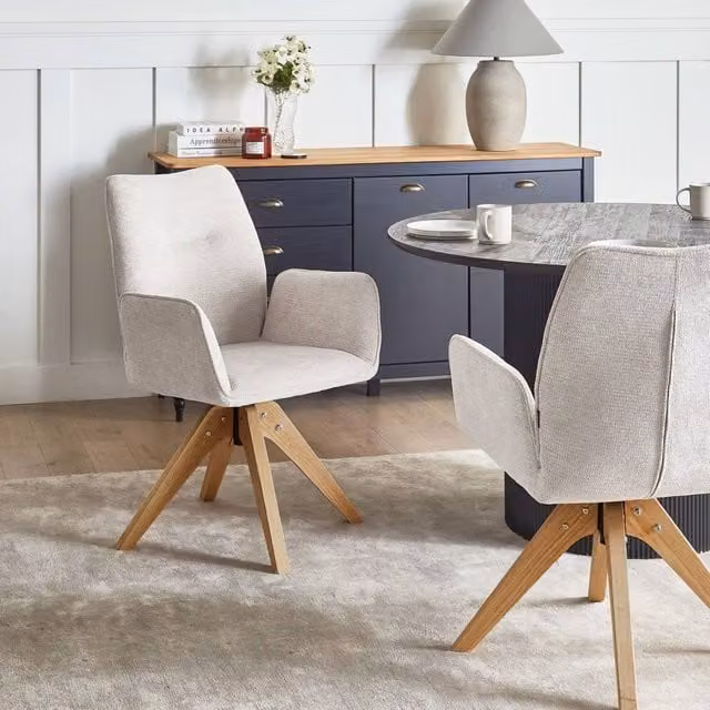Wyld and Coco Swivel Dining Chair in Beige Fabric with Wood Accents – 1