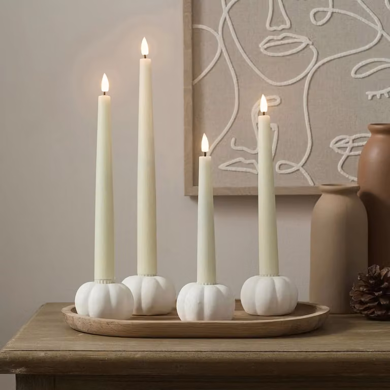 Set of 4 TruGlow Ivory LED Taper Candles with Matte White Ceramic Pumpkin Taper Candle Holders