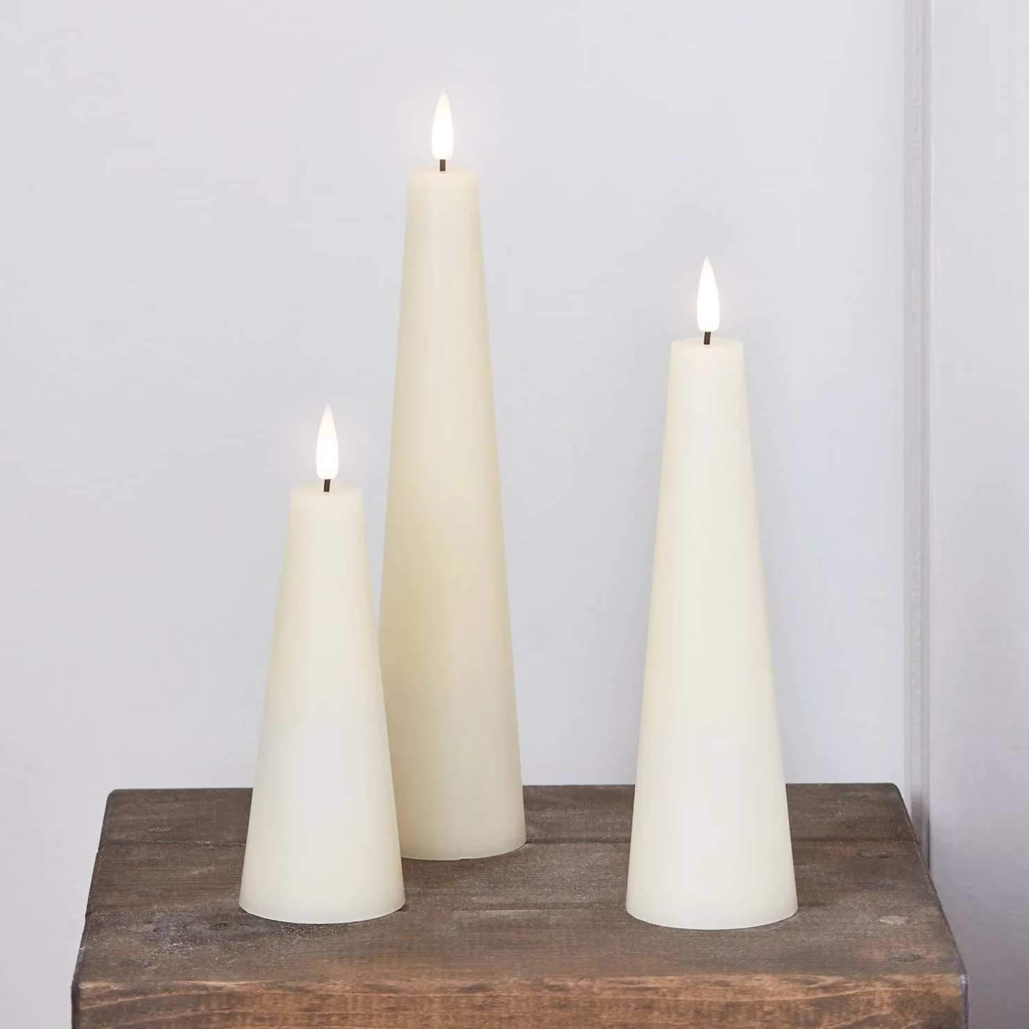TruGlow® Ivory Cone LED Pillar Candle Trio with Remote Control and Timer, Beige Wax Tabletop Candles with Flicker Effect