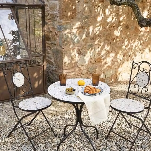 Wyld and Coco Set of 2 Black Metal Folding Chairs with Terrazzo Pattern Ceramic Backrest