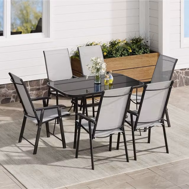 Komore Black Rectangular Tempered Glass Garden Table with Six Foldable Chairs
