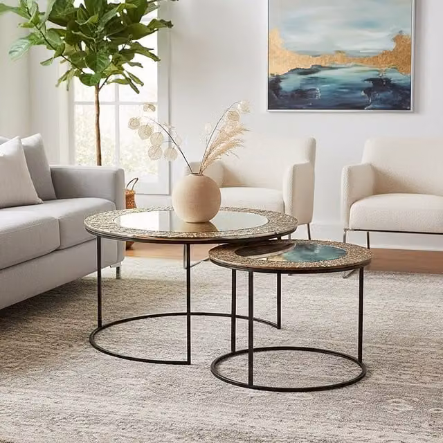 Orsina Set of 2 Round Glass Nesting Coffee Tables with Black Steel Legs in Silver – 1