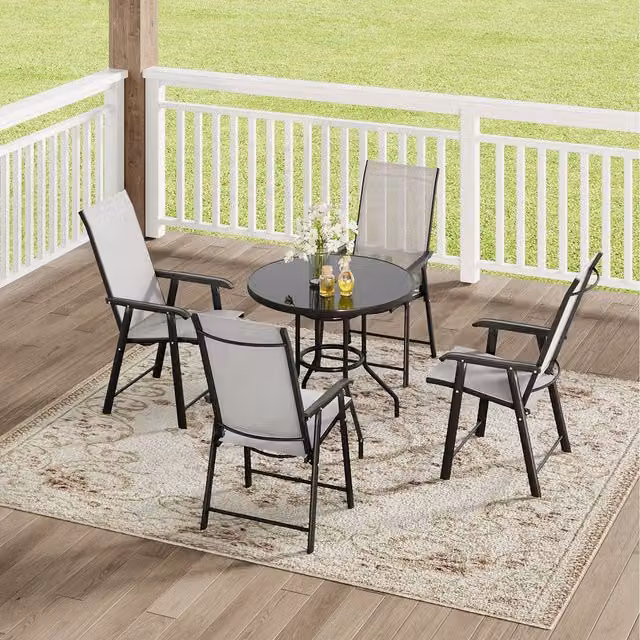 Komore Classic Metal Outdoor Garden Table with Parasol Hole and Four Folding Chairs in Matt Black