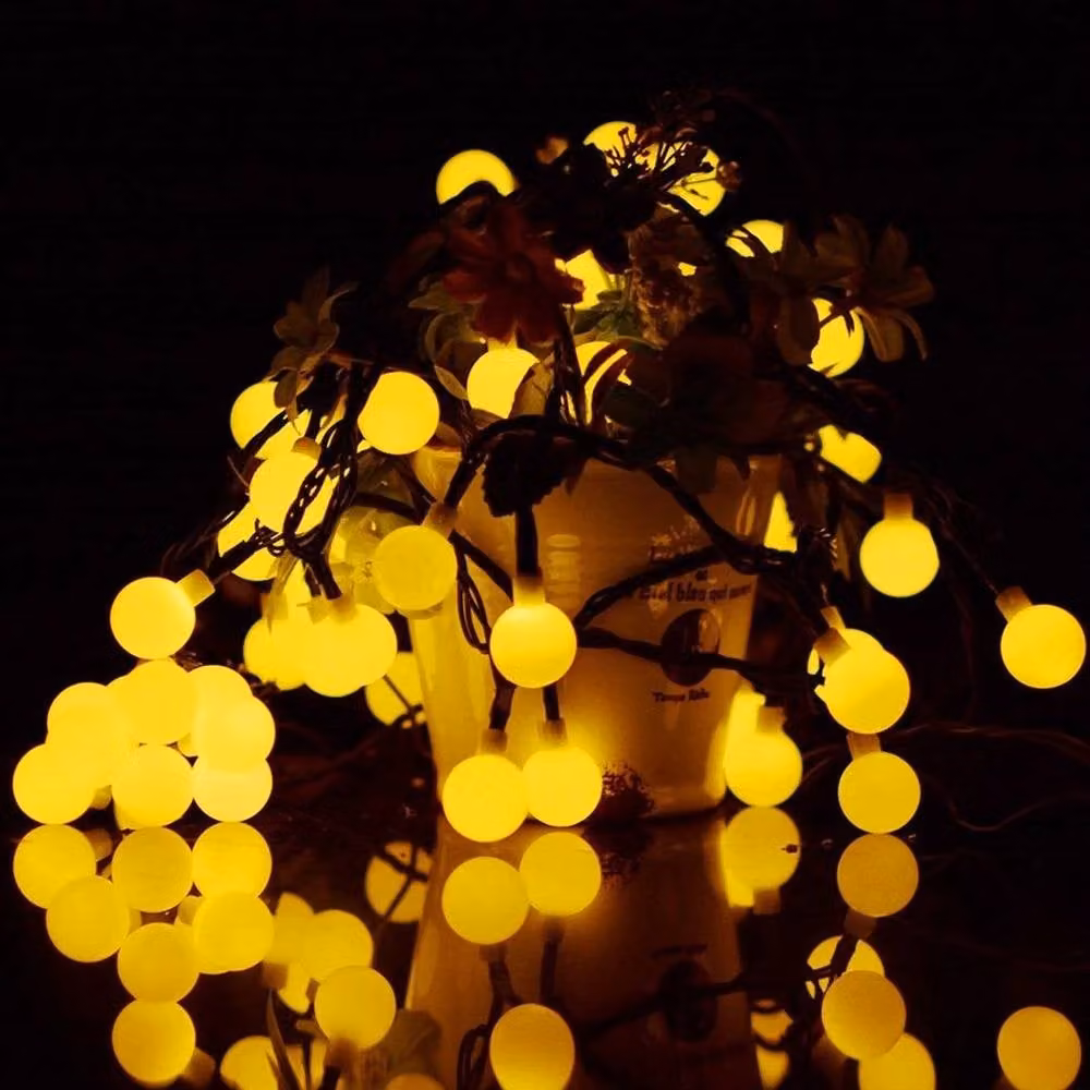 NESTLUNE Solar LED Ball String Lights in Warm White with Remote Control and Timer, 12m Outdoor Party Fairy Lights – 5