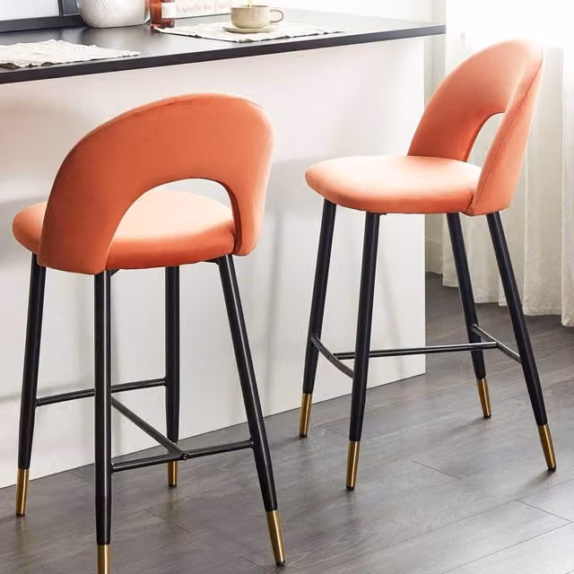 Wyld and Coco Set of 2 Retro Velvet Bar Chairs in Coral Red with Black Steel and Gold Accents – 1