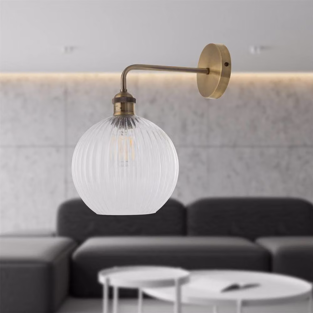 First Choice Lighting Isaac Antique Brass Wall Light with Transparent Glass Shade in Gold – 2