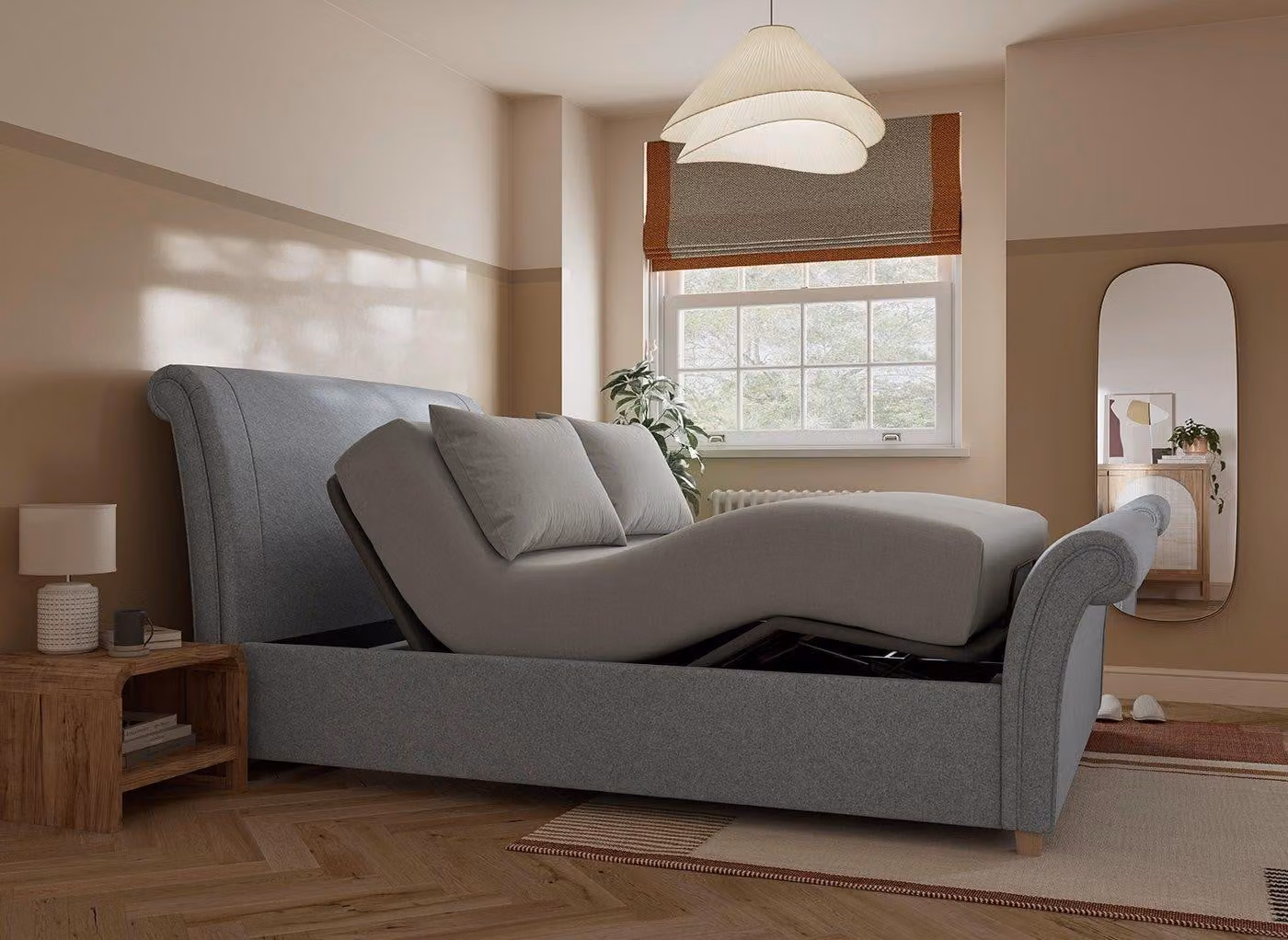 Dreams Delaware Ergomotion Adjustable Upholstered Sleigh Bed Frame in Grey Fabric with USB Charging Port and Massage Function