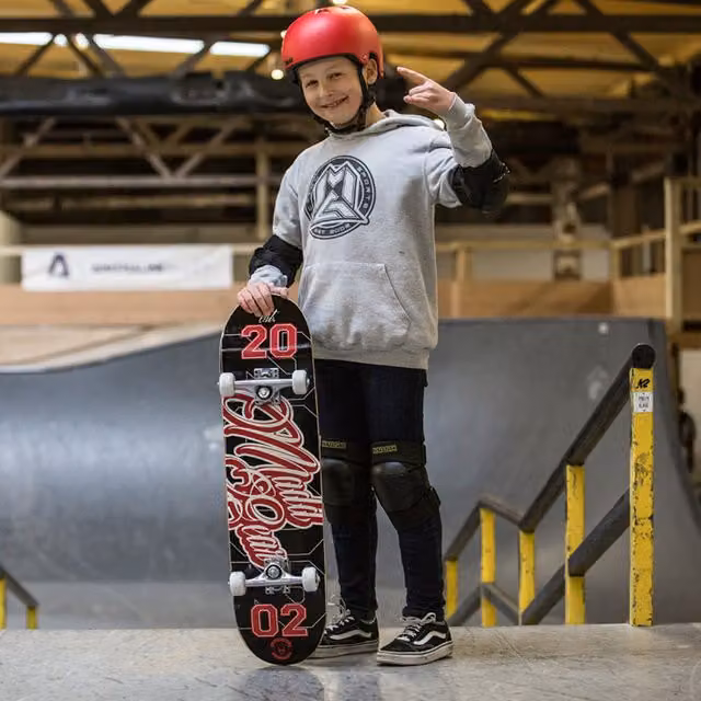 Madd Gear Junior Pro Skateboard in Gameplay Black