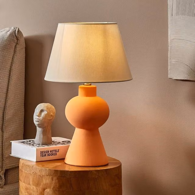 Wyld and Coco Orange Ceramic Table Lamp with Hand Painted Geometric Base and White Linen Drum Shade