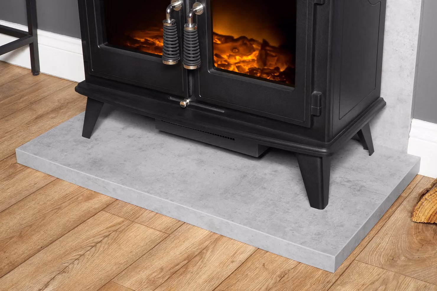 Acantha Fires & Fireplaces Woodhouse Electric Wall Mounted Stove with Tile and Hearth Set in Black Concrete Effect and Angled Pipe – 4