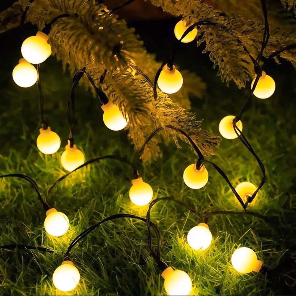 NESTLUNE Solar LED Ball String Lights in Warm White with Remote Control and Timer, 12m Outdoor Party Fairy Lights – 6