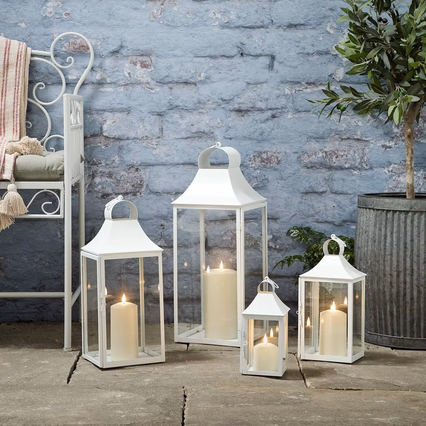 Set of 4 Albury White Metal Tabletop Garden Lanterns with TruGlow Battery Operated Pillar Candles and Remote Control