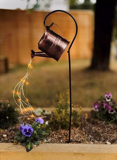 Marco Paul Solar Powered LED Watering Can Garden Light in Copper and Multicolour