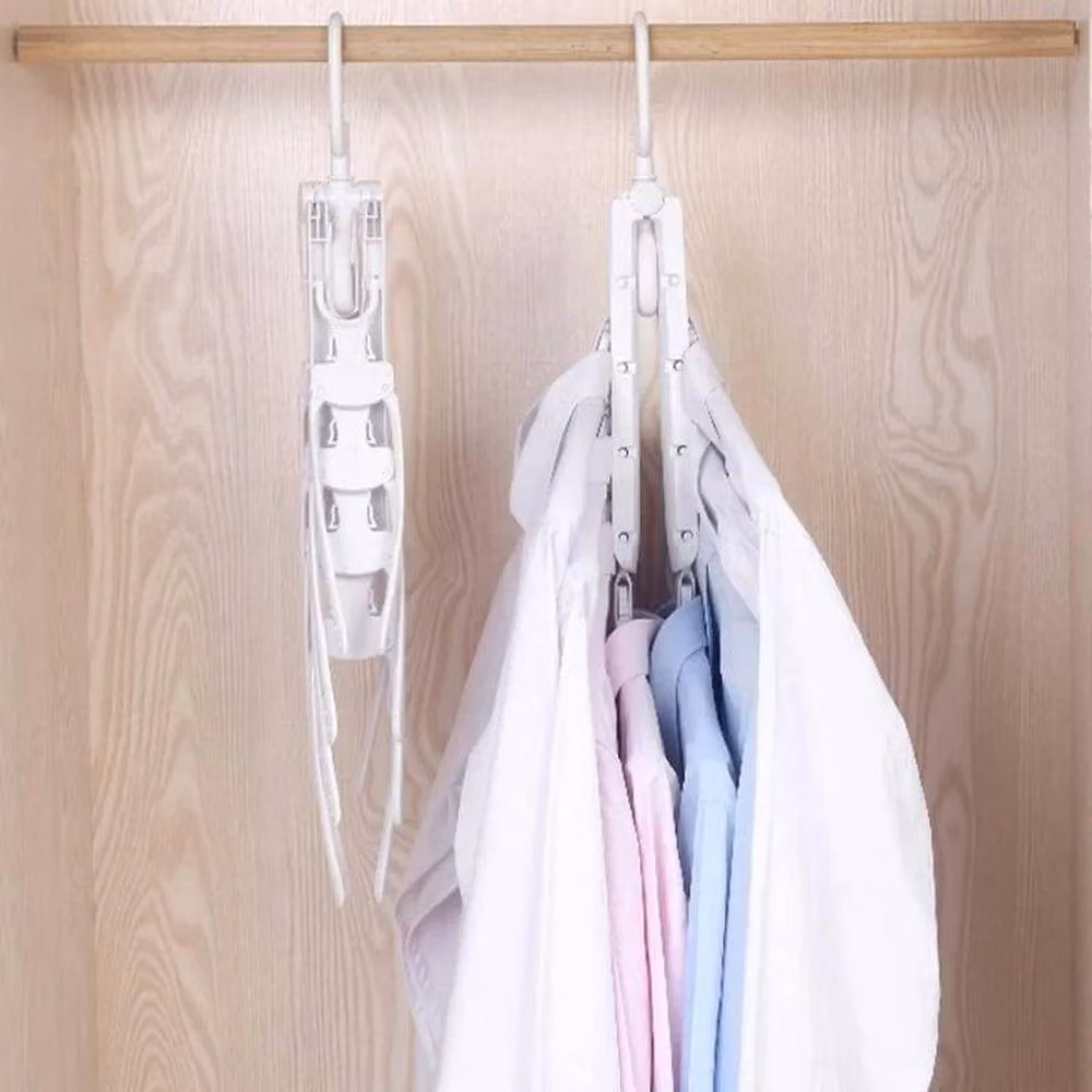KORVIXA Non-Slip Folding Plastic Coat Hangers in White with Swivel Hook – 4