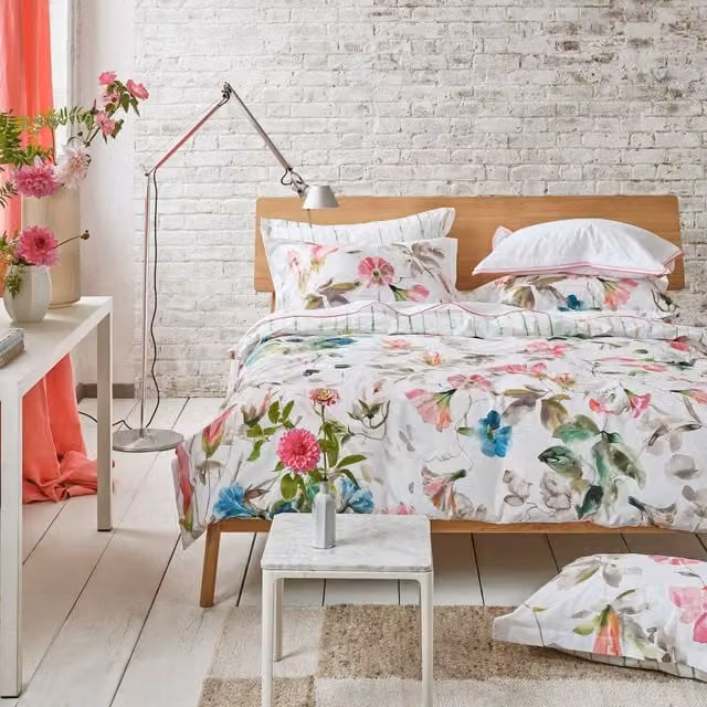 Designers Guild Japanese Magnolia Reversible Floral Cotton Percale Duvet Cover Bedding Set in White and Green