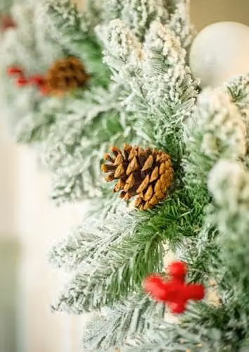 HomeZone Premium 9ft Snow Frosted Christmas Garland with Pine Cones in Green and White – 7