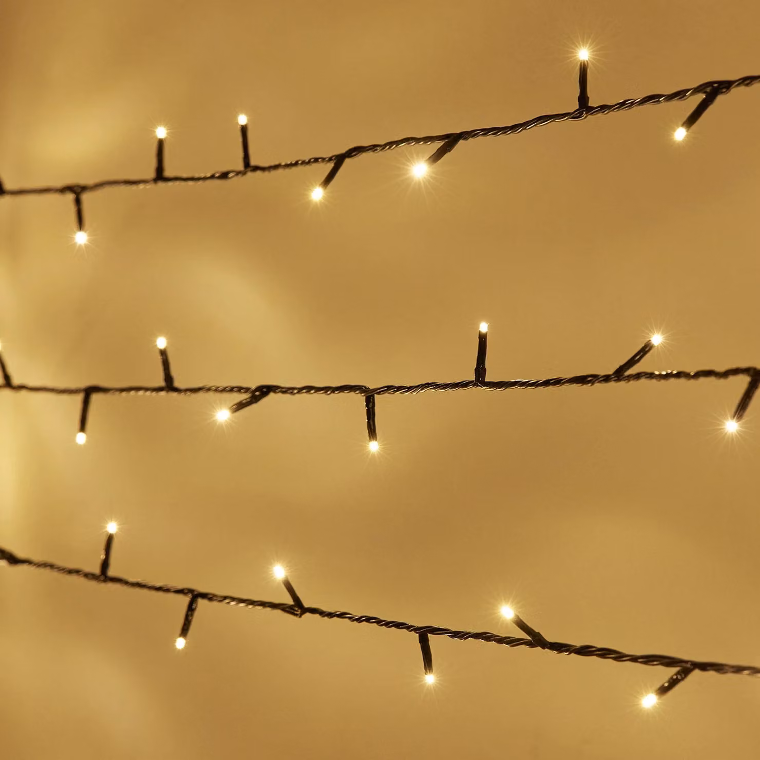 Lights4fun Essential Connect Warm White Connectable Fairy Lights with Timer and Green Cable, 60m