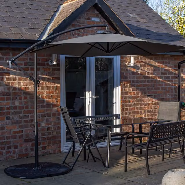 Samuel Alexander 6 Person Modern Glass Dining Set with Benches, Chairs, Grey Banana Parasol and Black Base
