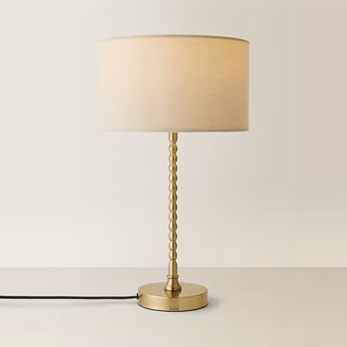 ValueLights Maeve Fabric Drum Table Lamp with Brushed Gold Bobbin Detail in Beige and White