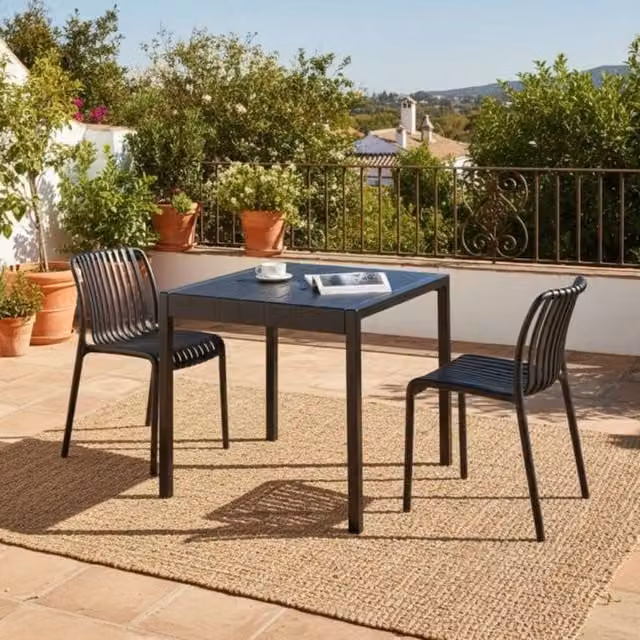 Wyld and Coco Garden 4-Seater Black Weather-Resistant Rectangular Dining Table – 1
