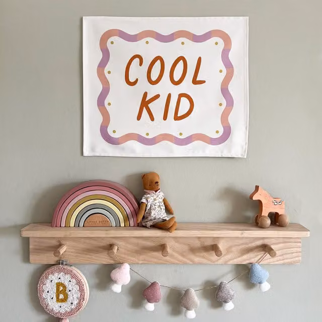 Kid of the Village Cool Kid Hanging Textile Banner in Orange and Purple