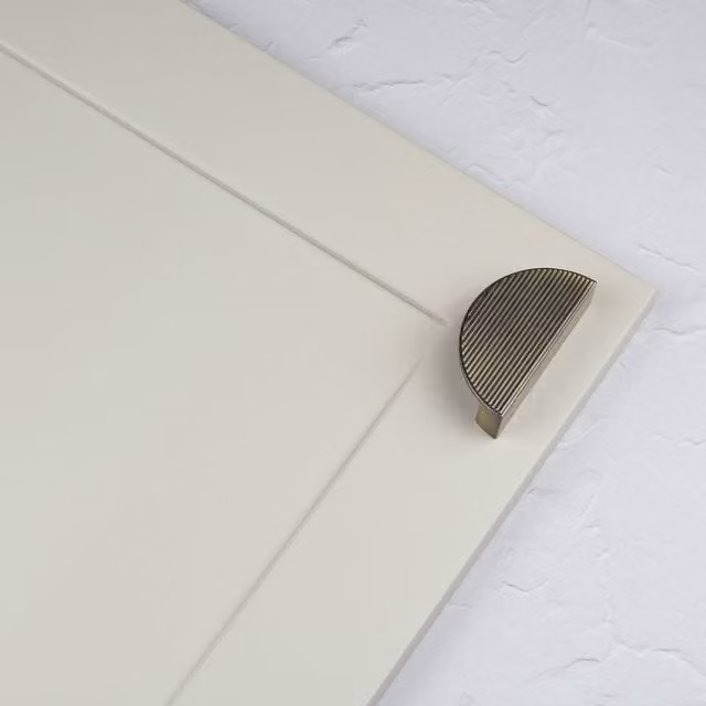 Handle & Home Ribbed Detailing Handles and Coordinating Knobs in Antique Brushed Brass