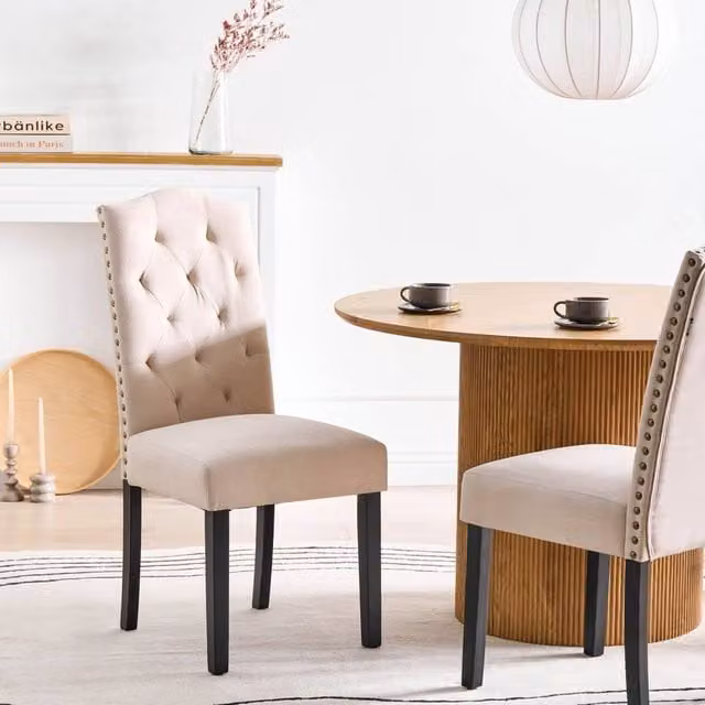 Wyld and Coco Set of 2 Velvet Dining Chairs in Light Beige with Black Rubberwood Legs