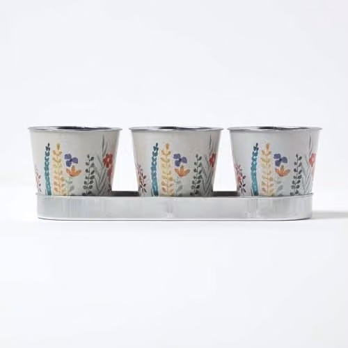 HOMESCAPES Set of 3 Metal Plant Pots with Tray, Floral Design, Grey, White and Multicolour, W/D/H: 33 x 11 x 10.5 cm