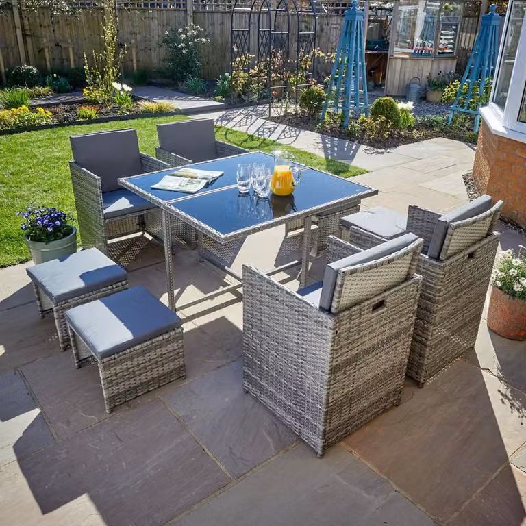 Home Source 9 Piece Grey Rattan Garden Furniture Set with 4 Chairs, 4 Footstools and Square Glass Top Table