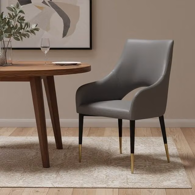 Orsina Gilden Grey Leather Effect Dining Chair with Gold Tip Legs in Black and Grey