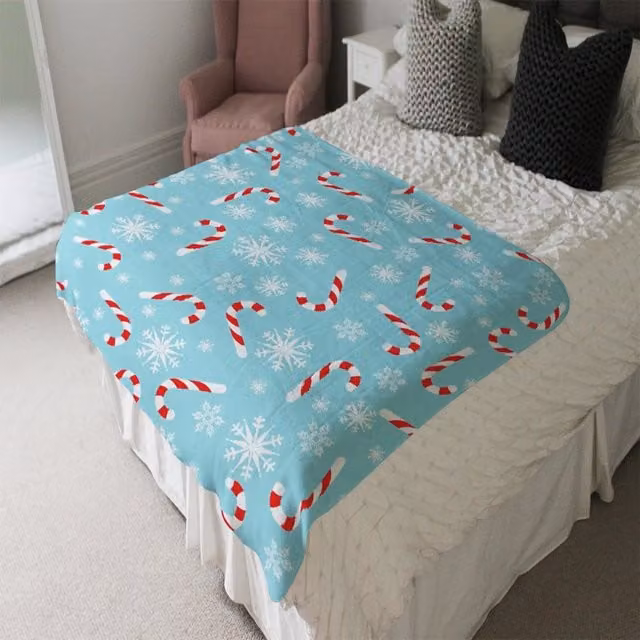 Benjamin Tate Design LTD Fluffy Candy Canes and Snowflakes Soft Blanket in Blue