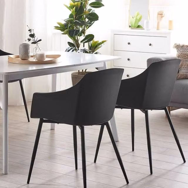 Wyld and Coco Set of 2 Black Minimalist Dining Chairs with Armrests and Matte Synthetic Leather Finish