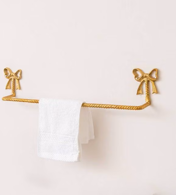 Melody Maison Metallic Gold Metal Bow Wall Mounted Towel Rail