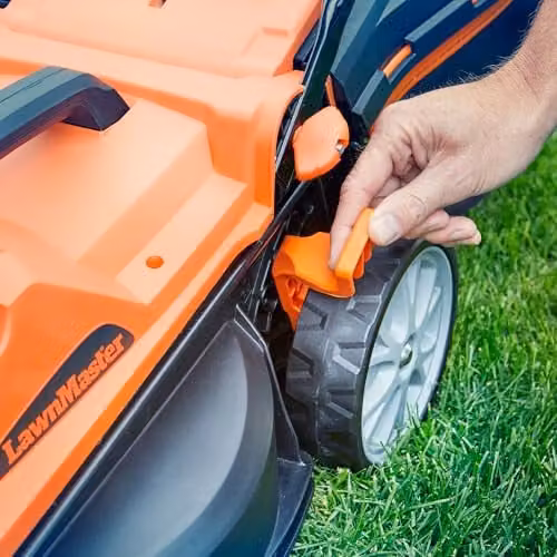 LawnMaster MX 24V 34cm Cordless Lawnmower in Orange with Rechargeable Battery, Fast Charger, Mulching Kit and Collection Bag – 3
