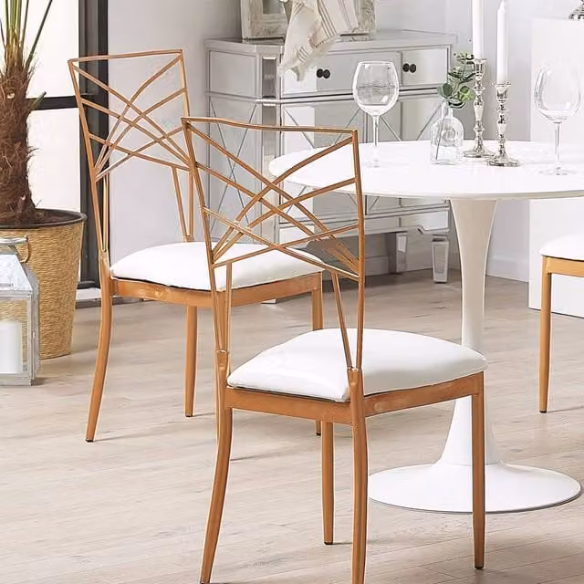 Wyld Haus Set of 2 Rose Gold Metal Dining Chairs with White Faux Leather Seats – 1
