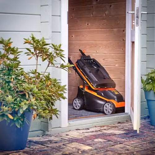 LawnMaster MX 24V 32cm Cordless Lawnmower in Orange with Rechargeable Battery and Fast Charger – 7