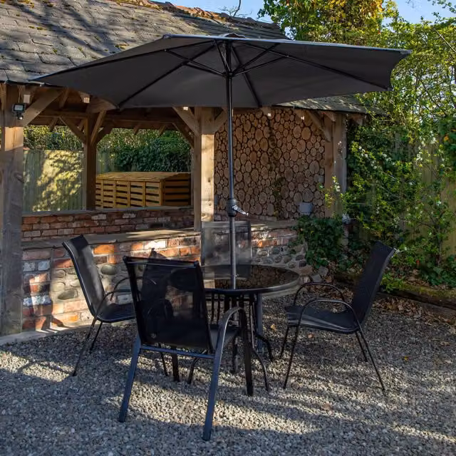 Samuel Alexander Modern Round Glass Top Garden Dining Table with Grey Parasol and Base