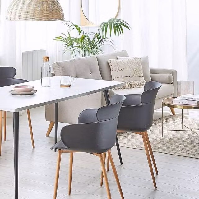 Wyld and Coco Set of 2 Black Synthetic Leather Dining Chairs with Metal Legs – 1