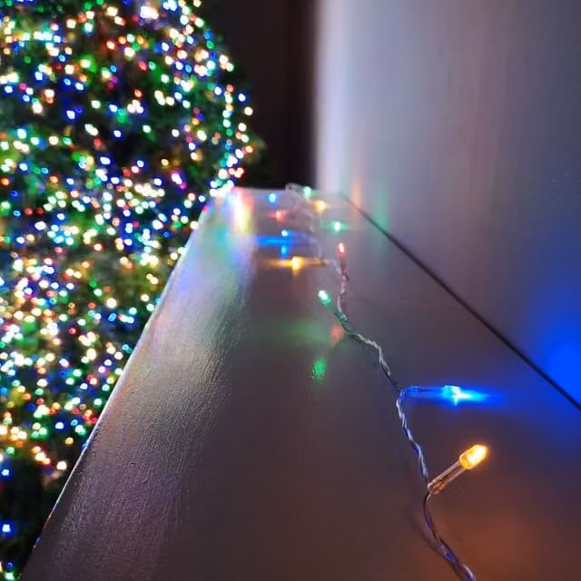 Samuel Alexander 20m Battery Operated Christmas String Lights with 200 Multi-Coloured LEDs on a Transparent Cable – 1
