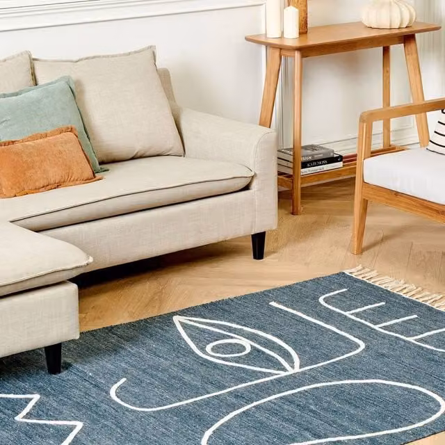 Wyld and Coco Blue Abstract Pattern Handwoven Polyester Rectangular Rug with Fringes W/D/H: 140 x 200 cm