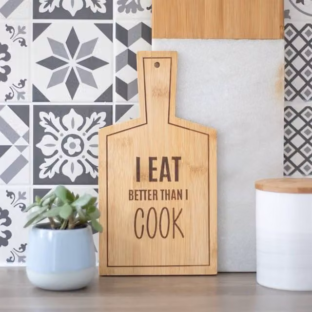 Uniqueful I Eat Better Than I Cook Bamboo Serving Board in Brown